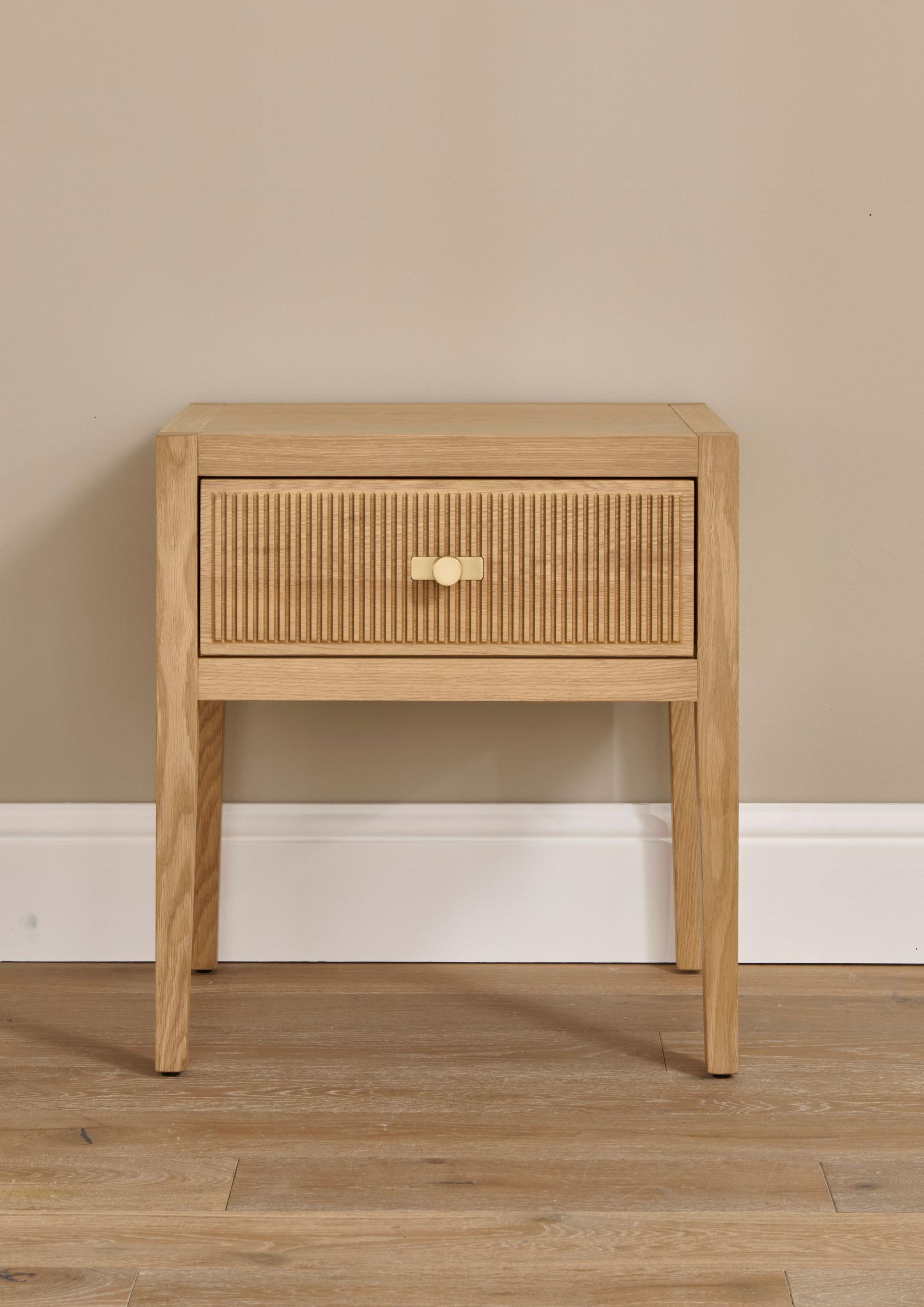 Lavinia Nightstand made in oak wood with 1 drawer. It features a reeded Art Deco design and solid brass hardware