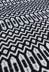 Halsey Black Outdoor Rug Halsey Black Outdoor Rug