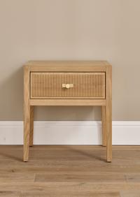 Lavinia Nightstand made in oak wood with 1 drawer. It features a reeded Art Deco design and solid brass hardware