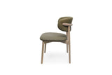 A modern dining chair with olive green upholstered seat and backrest, light wood legs, and a curved light wood armrest, shown against a plain white background.